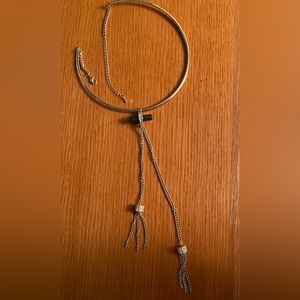 Gold Tone choker/lariat necklace.